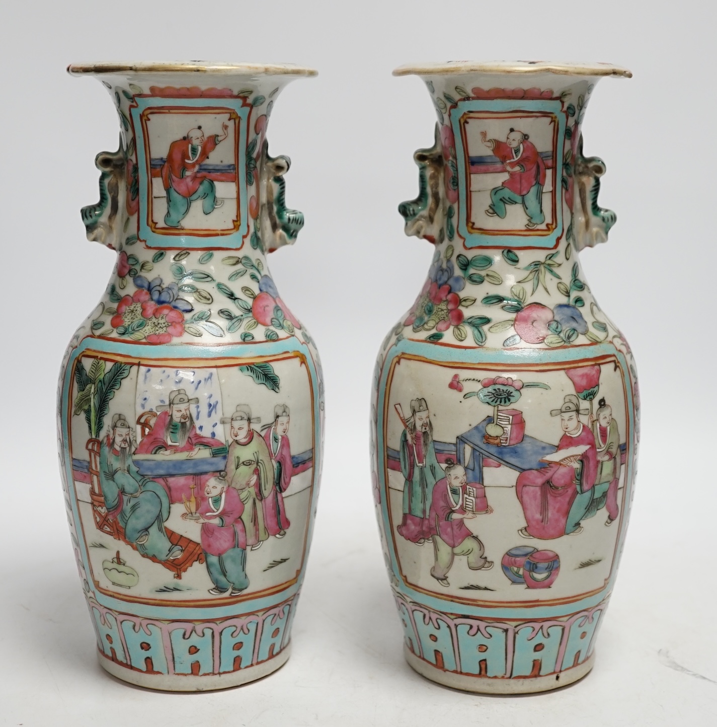 A pair of 19th century Chinese famille rose vases, 25cm high